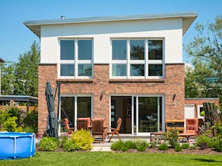 Massivhaus Pultus von ROTH MASSIVHAUS Schlüsselfertig ab 365000€, Pultdachhaus Außenansicht 2