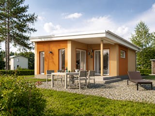 Massivhaus Minimassiv-Haus Poel von ROTH MASSIVHAUS Schlüsselfertig ab 217000€, Bungalow Außenansicht 1