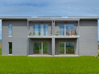 Fertighaus Mehrfamilienhaus Münch von Bau-Fritz - Mehrfamilienhäuser Schlüsselfertig ab 1015000€, Pultdachhaus Außenansicht 5