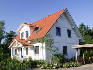 Fertighaus Carmen (KfW-Effizienzhaus 40 EE) von Dammann-Haus Schlüsselfertig ab 372500€, Satteldach-Klassiker Außenansicht 1
