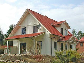 Fertighaus Carmen (KfW-Effizienzhaus 40 EE) von Dammann-Haus Schlüsselfertig ab 372500€, Satteldach-Klassiker Außenansicht 2