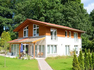 Fertighaus Jutta (KfW-Effizienzhaus 40 EE) von Dammann-Haus Schlüsselfertig ab 379200€, Satteldach-Klassiker Außenansicht 4