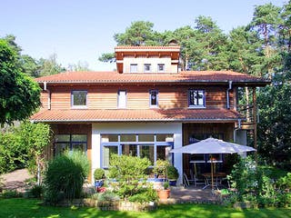 Fertighaus Margret (KfW-Effizienzhaus 40 EE) von Dammann-Haus Schlüsselfertig ab 508800€, Pultdachhaus Außenansicht 1