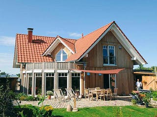 Fertighaus Martina (KfW-Effizienzhaus 40 EE) von Dammann-Haus Schlüsselfertig ab 424100€, Satteldach-Klassiker Außenansicht 1