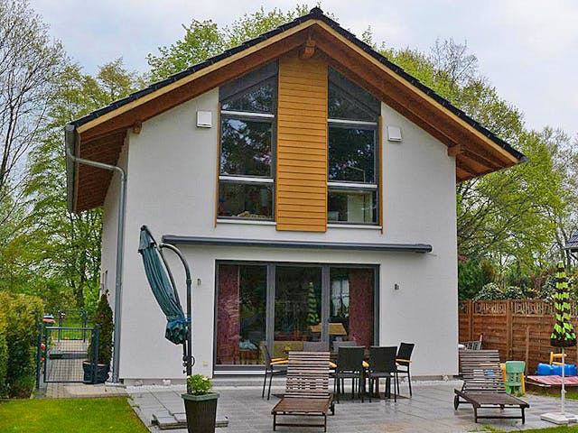 Fertighaus Nicole (KfW-Effizienzhaus 40 EE) von Dammann-Haus Schlüsselfertig ab 311700€, Satteldach-Klassiker Außenansicht 1
