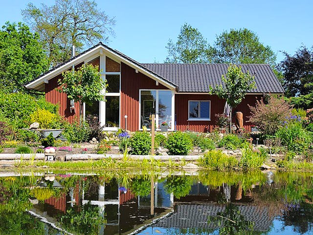 Fertighaus Rosi 3 (KfW-Effizienzhaus 40 EE) von Dammann-Haus Schlüsselfertig ab 328300€, Bungalow Außenansicht 1 Fertighaus Rosi 3 (KfW-Effizienzhaus 40 EE) von Dammann-Haus Schlüsselfertig ab 328300€, Bungalow Außenansicht 1