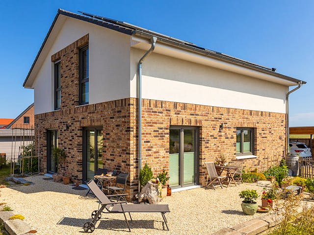 Massivhaus Scheunenhaus 130 von ECO System HAUS Schlüsselfertig ab 310900€, Satteldach-Klassiker Außenansicht 1