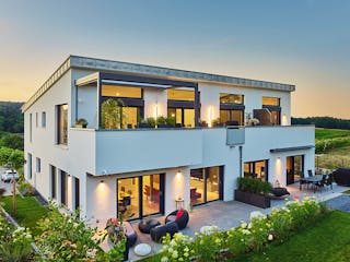 Fertighaus Dreifamilienhaus Chmel von Fertighaus WEISS - Mehrfamilienhäuser, Pultdachhaus Außenansicht 3
