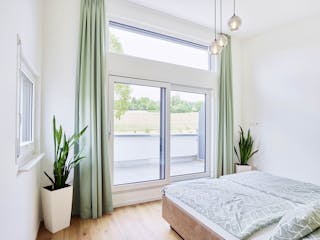 Fertighaus Dreifamilienhaus Chmel von Fertighaus WEISS - Mehrfamilienhäuser, Pultdachhaus Innenansicht 6