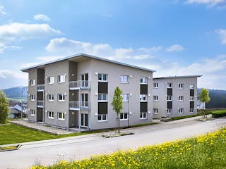 Fertighaus Mehrfamilienhaus in Oberrot von Fertighaus WEISS - Mehrfamilienhäuser, Pultdachhaus Außenansicht 1