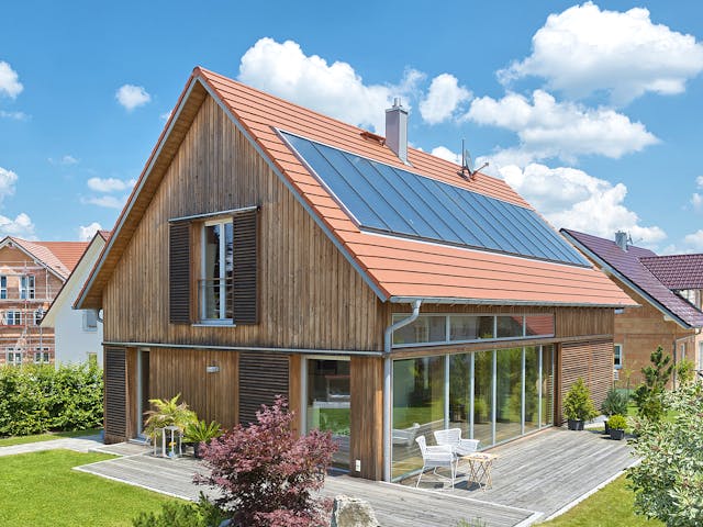 Fertighaus F174 - Kutter von Fluck Holzbau Schlüsselfertig ab 455000€, Satteldach-Klassiker Außenansicht 1