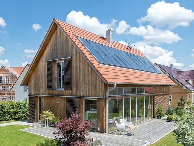 Fertighaus F174 - Kutter von Fluck Holzbau Schlüsselfertig ab 455000€, Satteldach-Klassiker Außenansicht 1