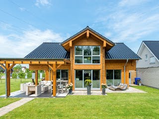 Blockhaus Münsterland von Fullwood Wohnblockhaus Ausbauhaus ab 400000€, Blockhaus Außenansicht 1