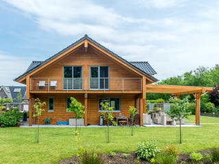 Blockhaus Münsterland von Fullwood Wohnblockhaus Ausbauhaus ab 400000€, Blockhaus Außenansicht 3