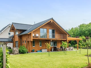 Blockhaus Münsterland von Fullwood Wohnblockhaus Ausbauhaus ab 400000€, Blockhaus Außenansicht 4