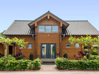 Blockhaus Münsterland von Fullwood Wohnblockhaus Ausbauhaus ab 400000€, Blockhaus Außenansicht 5