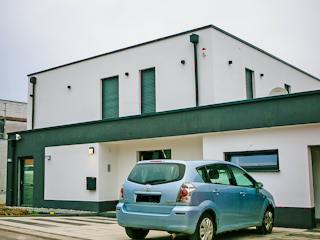 Massivhaus Stylisches Flachdachhaus von Massivhaus Rhein Lahn, Cubushaus Außenansicht 2