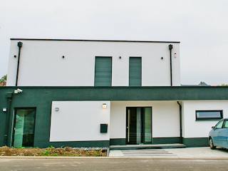 Massivhaus Stylisches Flachdachhaus von Massivhaus Rhein Lahn, Cubushaus Außenansicht 3