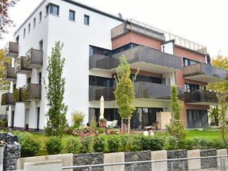 Massivhaus Mehrfamilienhaus mit Luxus und Eleganz von RheinMassiv Massivhäuser, Stadtvilla Außenansicht 4
