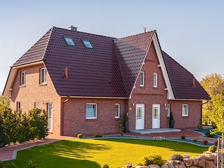 Massivhaus Duo Friesenhaus 130 von ECO System HAUS Schlüsselfertig ab 294500€, Satteldach-Klassiker Außenansicht 1
