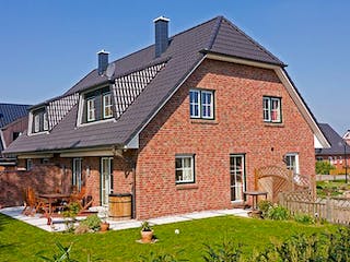 Massivhaus Duo Friesenhaus 130 von ECO System HAUS Schlüsselfertig ab 294500€, Satteldach-Klassiker Außenansicht 4