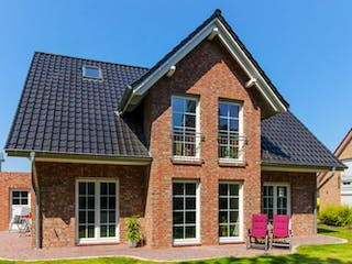 Massivhaus Kapitänshaus 150 von ECO System HAUS Schlüsselfertig ab 318900€, Satteldach-Klassiker Außenansicht 2