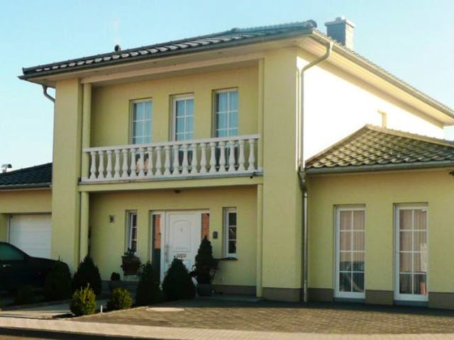 Massivhaus TOSKANA 150 von domoplan massivhaus, Stadtvilla Außenansicht 1 Massivhaus TOSKANA 150 von domoplan massivhaus, Stadtvilla Außenansicht 1