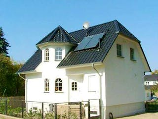 Massivhaus WHITE PEARL 130 von domoplan massivhaus, Außenansicht 2