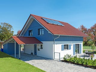 Blockhaus D138 Seifert von Frammelsberger Holzbau, Satteldach-Klassiker Außenansicht 1