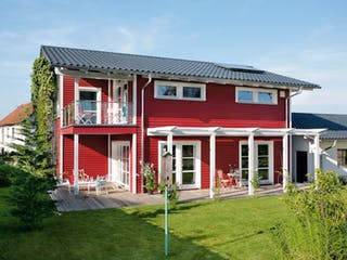 Fertighaus E 15-153.2 - Fertighaus mit Doppelgarage von SchwörerHaus Schlüsselfertig ab 456675€, Außenansicht 1