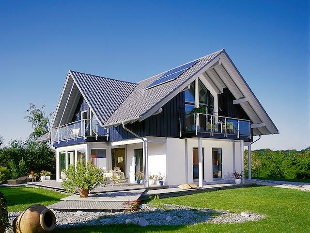 Fertighaus E 15-205.1 - Haus mit Wintergarten von SchwörerHaus Schlüsselfertig ab 576747€, Außenansicht 1
