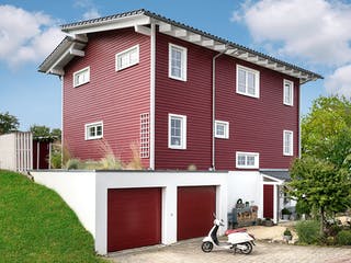 Fertighaus E 20-168.1 - Fertighaus im skandinavischen Landhausstil & Hampton-Flair von SchwörerHaus, Außenansicht 2