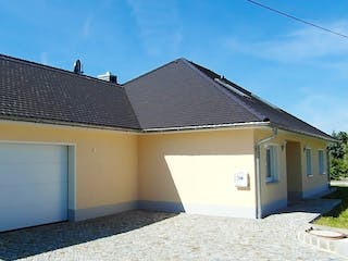 Massivhaus Bunganlow 353 von WEIOTT-Massiv-Haus, Bungalow Außenansicht 2