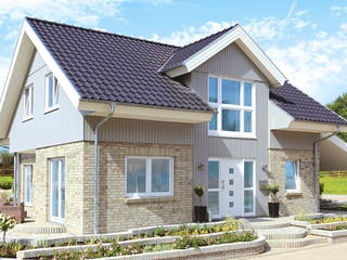 Fertighaus Westerland - Winkelhaus im Landhausstil von Danhaus Deutschland Schlüsselfertig ab 474901€, Außenansicht 1