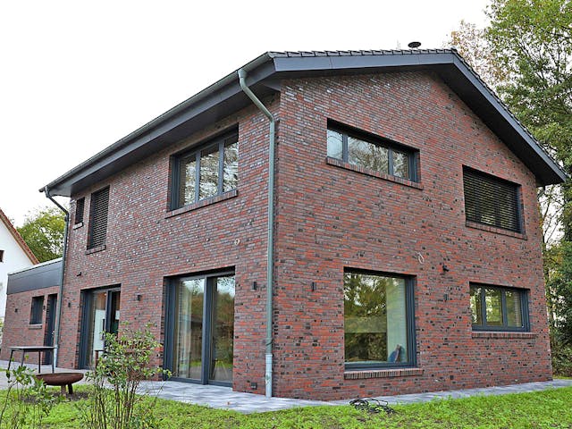 Fertighaus Massivholzhaus Stadthaus Modern von Zimmerer-Profibau Schlüsselfertig ab 1000000€, Außenansicht 1