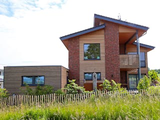 Fertighaus Pultdachhaus Modern von Zimmerer-Profibau Schlüsselfertig ab 550000€, Pultdachhaus Außenansicht 3